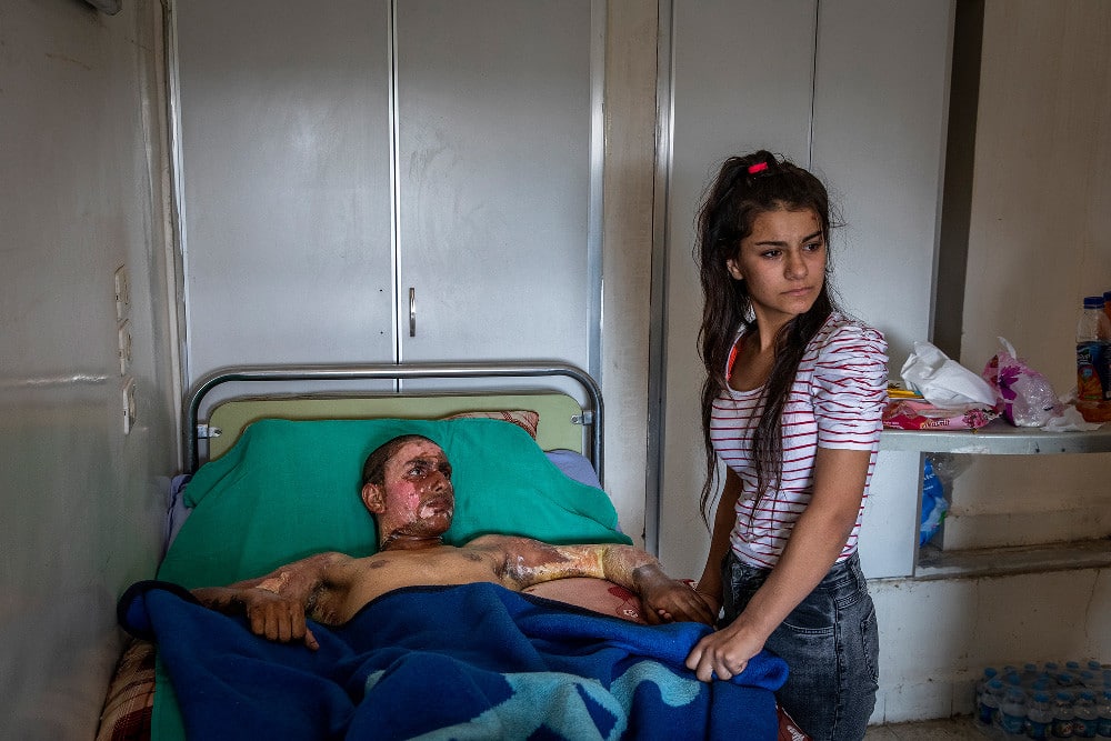 'Injured Kurdish Fighter Receives Hospital Visit' © Ivor Prickett (Irlanda) para The New York Times